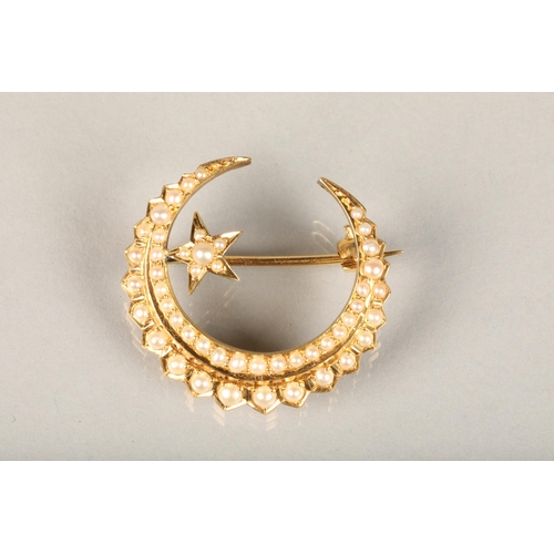 224 - Edwardian 15ct gold and seed pearl brooch, of crescent moon shape form with twin rows of graduating ... 