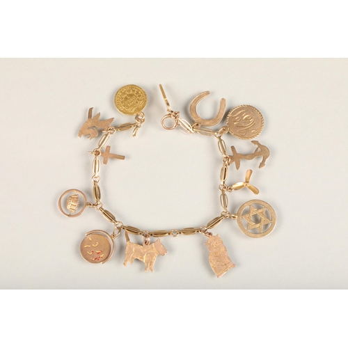 229 - Unmarked gold charm bracelet set with ten marked 9ct gold charms, two unmarked yellow metal charms a... 