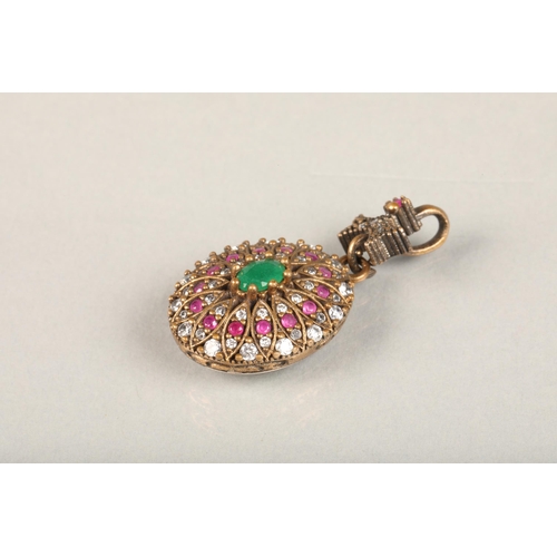 251 - Indian emerald, ruby and white stone oval cluster pendant, the central oval emerald surrounded with ... 