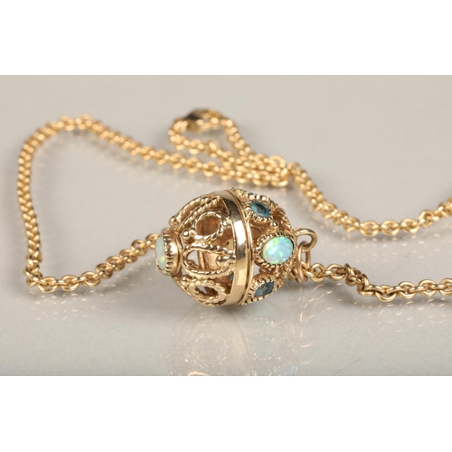 256 - 9ct gold and opal ball pendant, the round open wire work ball pendant studded with cabochon opals an... 