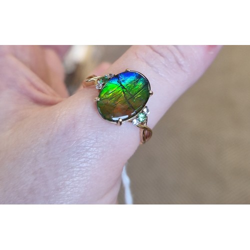 101 - AA Ammolite 9ct gold set including size R/S ring, pendant, and pair of earrings, each with authentic... 