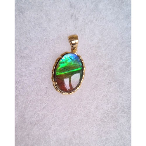 101 - AA Ammolite 9ct gold set including size R/S ring, pendant, and pair of earrings, each with authentic... 