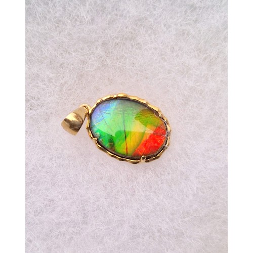 101 - AA Ammolite 9ct gold set including size R/S ring, pendant, and pair of earrings, each with authentic... 