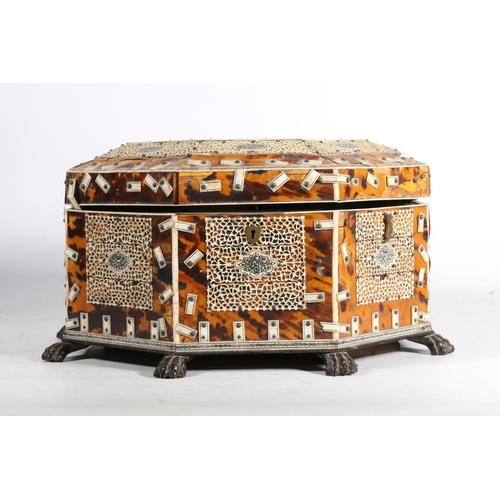 378 - Anglo Indian tortoiseshell and ivory work box, 19th century, of octagonal form on wooden lion paw fe... 