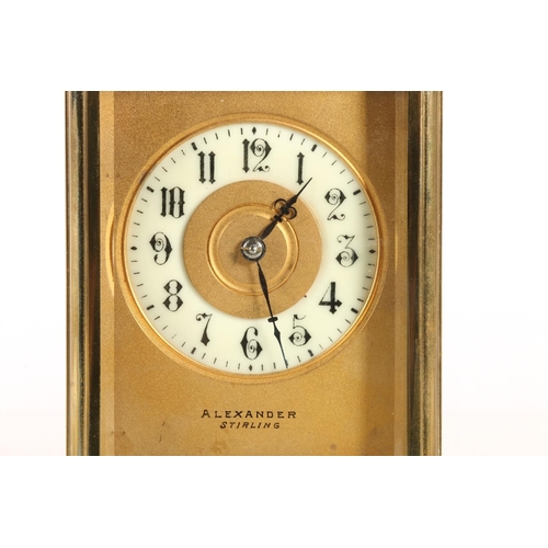 385 - Early 20th century brass carriage clock timepiece, the cream porcelain chapter ring dial with Arabic... 