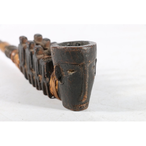 Two Burmese/Indian carved wooden smoking pipes, possibly of Naga origin ...