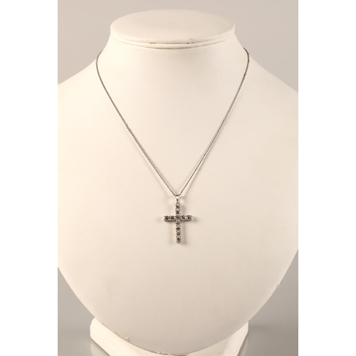 106 - Ladies 18k white gold diamond cross pendant, on an 18ct white gold chain.