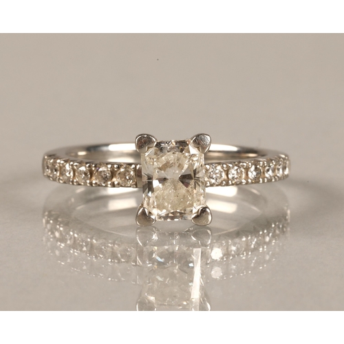 110 - Ladies platinum 0.75 carat diamond solitaire ring with diamond shoulders, ring size K/L.