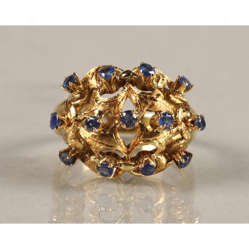 55 - Ladies 18ct yellow gold sapphire ring, mounted with thirteen small sapphires, ring size N.