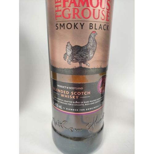 1 - Glen Moray single Speyside malt Scotch whisky, 70cl, 40% vol, tubed, with The Famous Grouse smoky bl... 