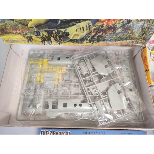 116 - Group of boxed model construction kits to include a 1:48 scale Academy Hobby Model Kits CH-46A/D 