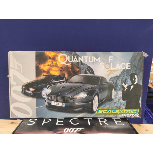 118 - Two boxed James Bond 007 related Scalextric sets to include Spectre Aston Martin DB10 & Jaguar C... 