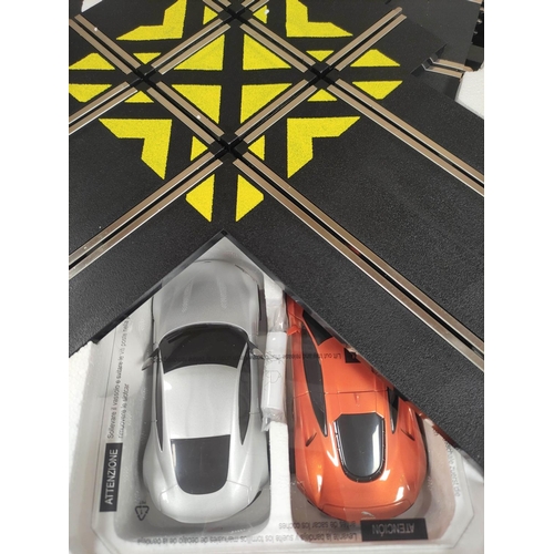 118 - Two boxed James Bond 007 related Scalextric sets to include Spectre Aston Martin DB10 & Jaguar C... 