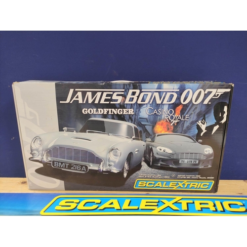 119 - Two boxed Scalextric sets to include a James Bond 007 Goldfinger / Casino Royale set with Aston Mart... 