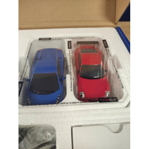 120 - Two boxed Scalextric sets to include Speed Stars Lamborghini Gallardo and Porsche 997 set C1243, and... 