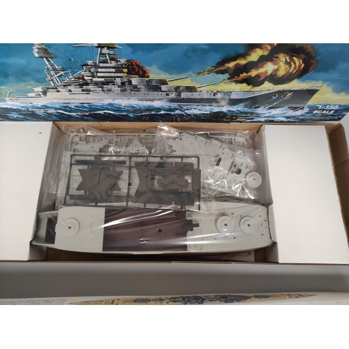 129 - Two boxed 1:350 scale model ships to include a Tamiya British Battleship King George V No.10, and a ... 