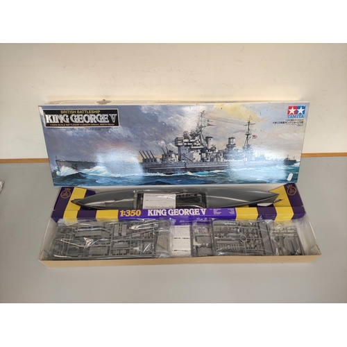 129 - Two boxed 1:350 scale model ships to include a Tamiya British Battleship King George V No.10, and a ... 