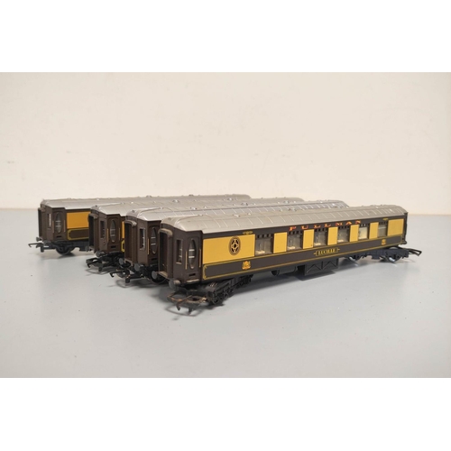 265 - Box containing a large collection of 00 gauge rolling stock comprising of four Pullman Carriages ''L... 