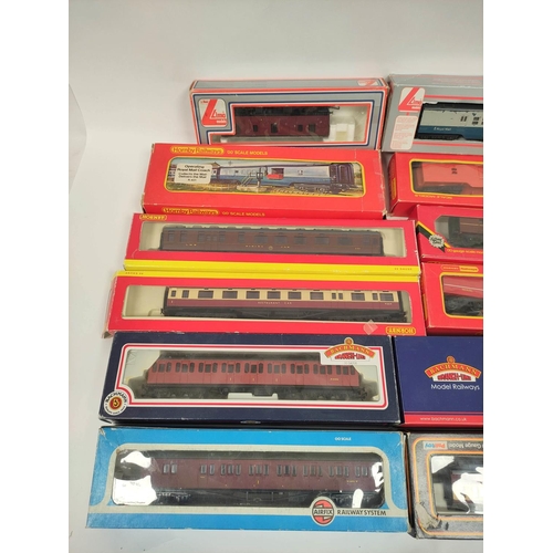 274 - Twelve boxed 00 gauge rolling stock carriages to include a Bachmann Branchline 34-701 BR Standard Mk... 