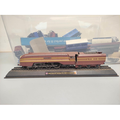 275 - Box containing a large collection of 00 gauge rolling stock and models comprising of an LMS Coronati... 