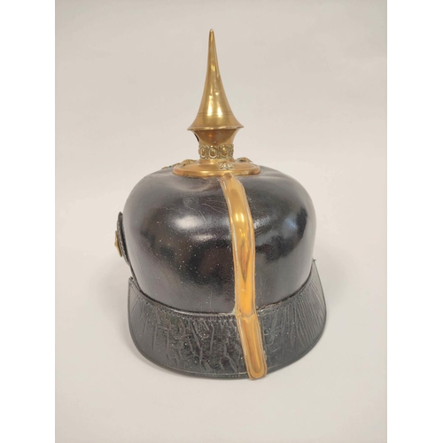 367 - Imperial German Pickelhaube spiked officer's helmet model 1897. The helmet of black leather construc... 