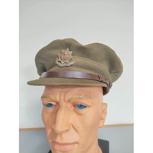 372 - Two British Khaki soft caps, comprising of a WW2 issue by J Collett Ltd London, and another unattrib... 