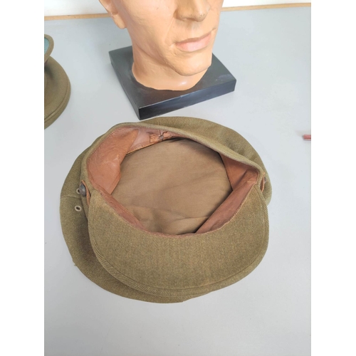 372 - Two British Khaki soft caps, comprising of a WW2 issue by J Collett Ltd London, and another unattrib... 