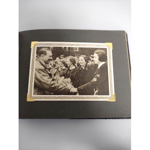 383 - German Third Reich collectables to include an Ehren Chronik (honour chronicle), a postcard album, tw... 