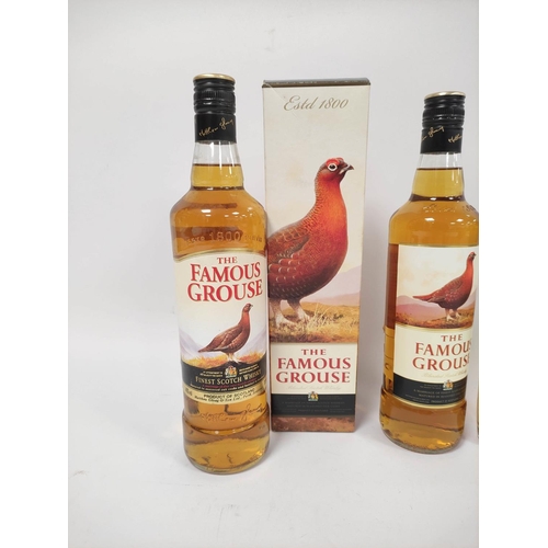 5 - Two bottles of The Famous Grouse Finest blended Scotch whisky, 70cl, 40% vol, one boxed, with half a... 