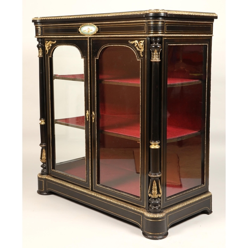 511 - Victorian ebonised cabinet, with gilt decoration and hand painted ceramic cartouche depicting a coup... 