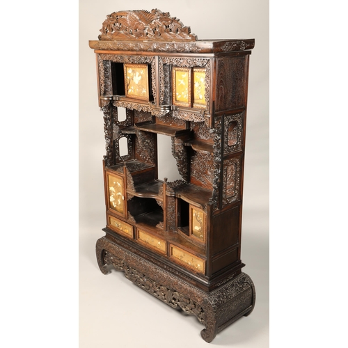 510 - Impressive Japanese Shodana hardwood cabinet,  intricately carved with foliage and birds, the drawer... 