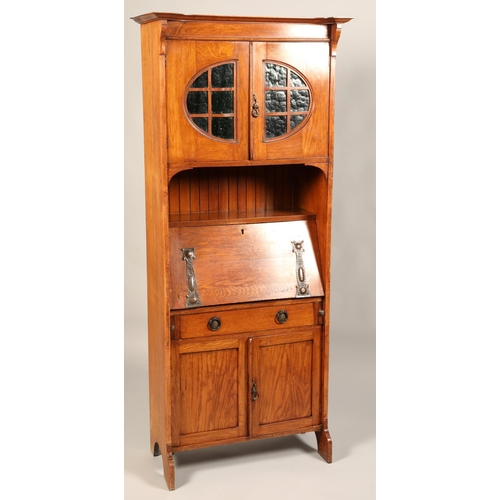 530 - Arts and crafts oak bureau bookcase, with copped stylized mounts, green glazed top cupboard, 179 x 7... 