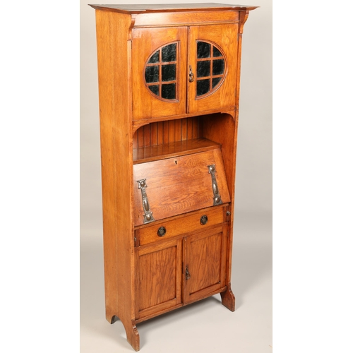 530 - Arts and crafts oak bureau bookcase, with copped stylized mounts, green glazed top cupboard, 179 x 7... 