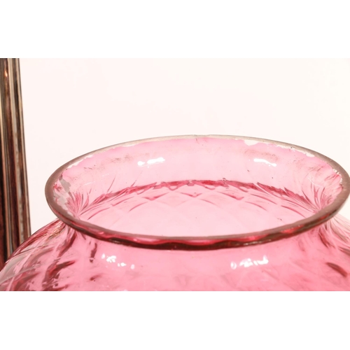 384 - Victorian silver plated Corinthian column oil lamp base, the cranberry glass shade over clear cut gl... 