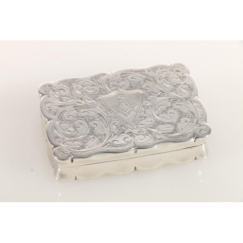 65 - Edward VII silver snuff box of rectangular form with shaped edges, the body engraved with scrolled a... 