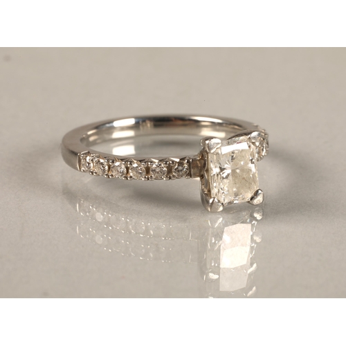 110 - Ladies platinum 0.75 carat diamond solitaire ring with diamond shoulders, ring size K/L.