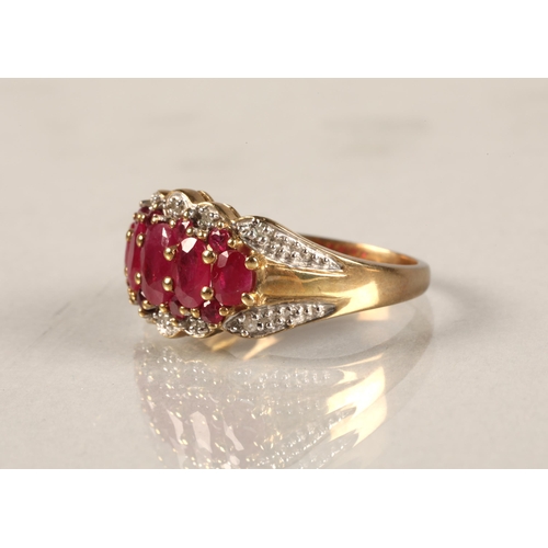 49 - Ladies 9 ct yellow gold graduated ruby & diamond ring, ring size L.