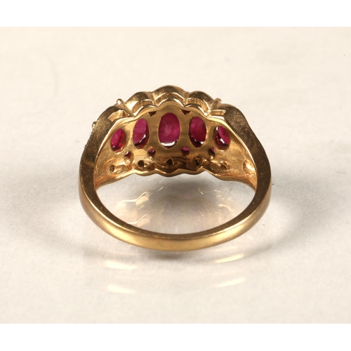 49 - Ladies 9 ct yellow gold graduated ruby & diamond ring, ring size L.