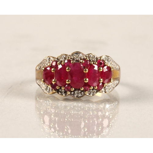 49 - Ladies 9 ct yellow gold graduated ruby & diamond ring, ring size L.