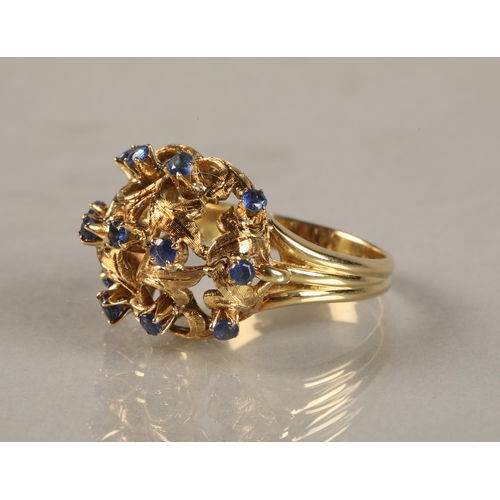 55 - Ladies 18ct yellow gold sapphire ring, mounted with thirteen small sapphires, ring size N.