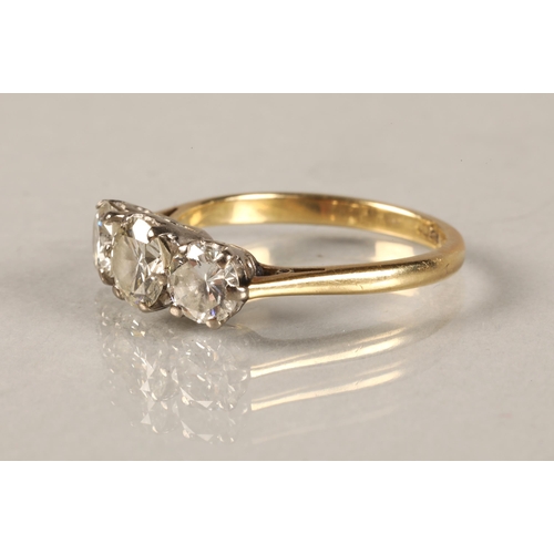 57 - Ladies 18ct yellow gold three stone diamond ring, central stone 0.5 carat with 0.33 carat stone at e... 