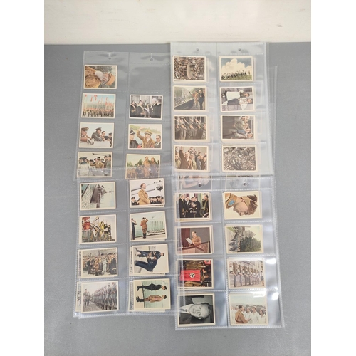 384 - German Third Reich cigarette cards to include examples by Constantin, Josetti and others with scenes... 