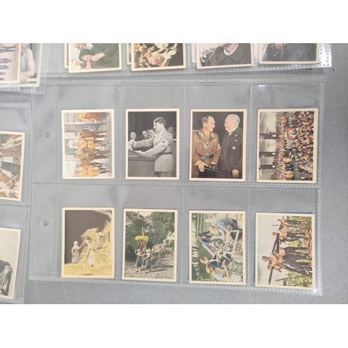 384 - German Third Reich cigarette cards to include examples by Constantin, Josetti and others with scenes... 