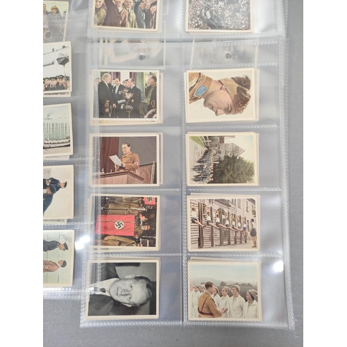 384 - German Third Reich cigarette cards to include examples by Constantin, Josetti and others with scenes... 