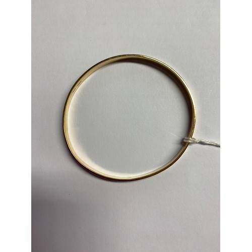 57 - 9ct gold bangle 15.6g