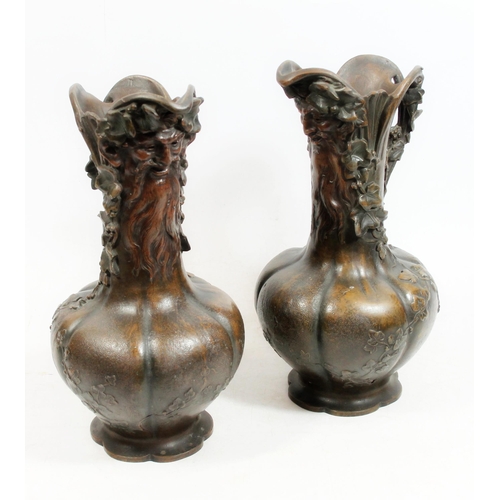 380 - After Charles Georges Ferville-Suan (French 1847-1925), a pair of bronzed spelter ewers, the cast bo... 