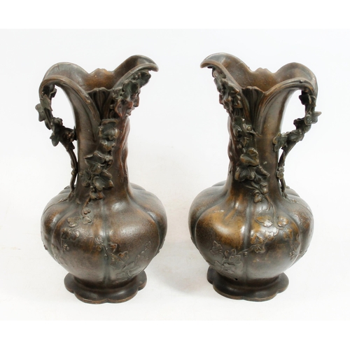 380 - After Charles Georges Ferville-Suan (French 1847-1925), a pair of bronzed spelter ewers, the cast bo... 