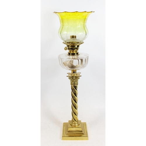 383 - Victorian brass oil lamp, of wrythen Corinthian column form on stepped base, clear slice cut reservo... 