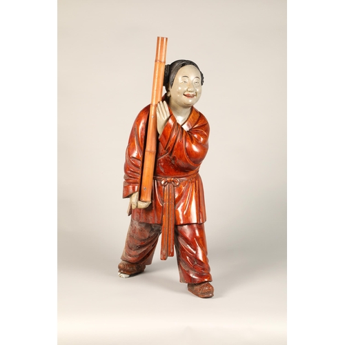 223 - Japanese wooden carved figure, 76cm high.