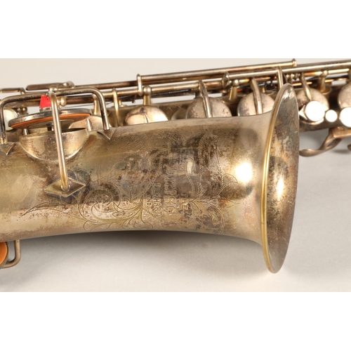 316 - Beuscher C Melody Saxophone, engraved 'The Beuscher Elkhart IND' on the bell and further stamped 175... 